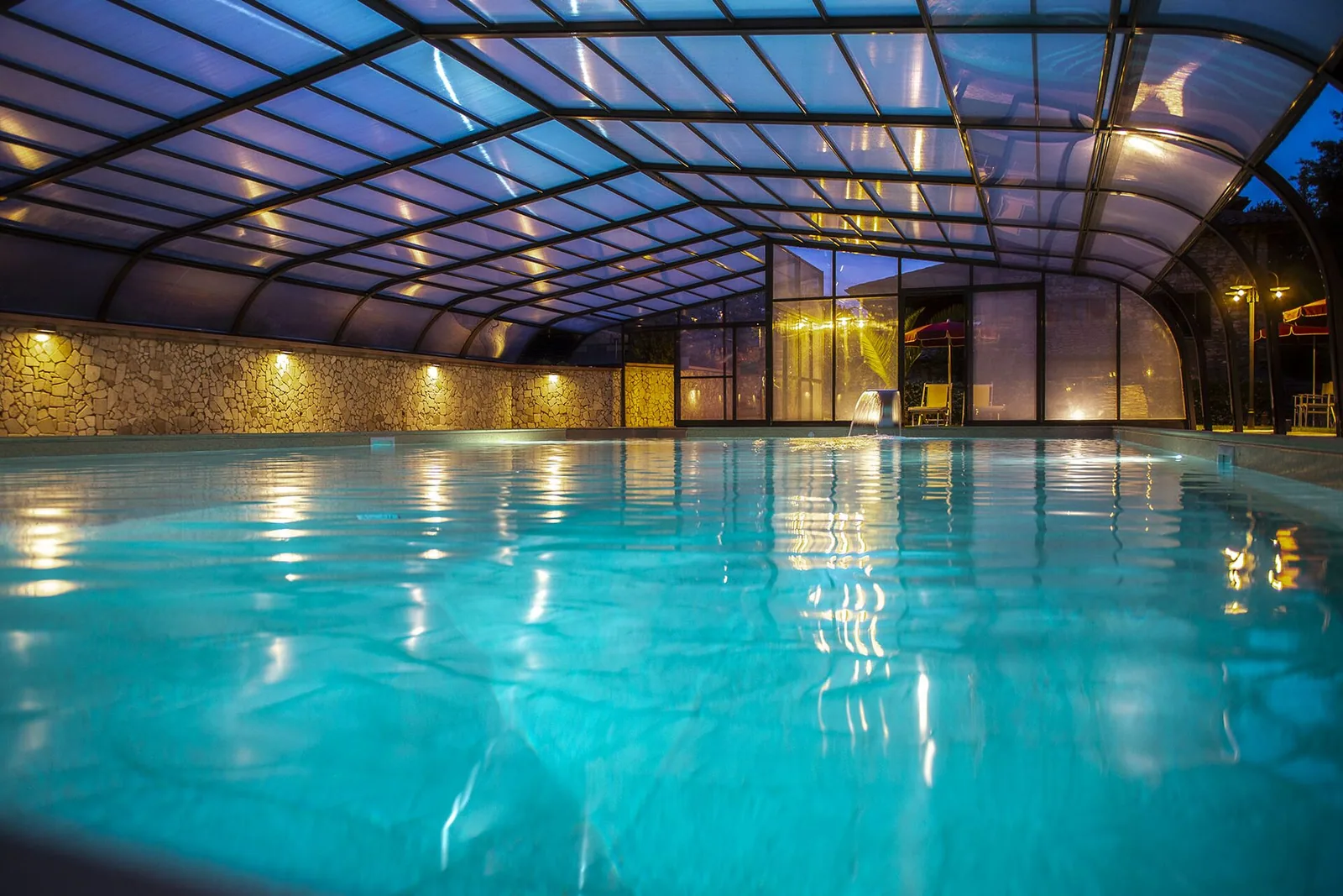 The covered pool at dusk